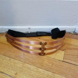 Brass belt